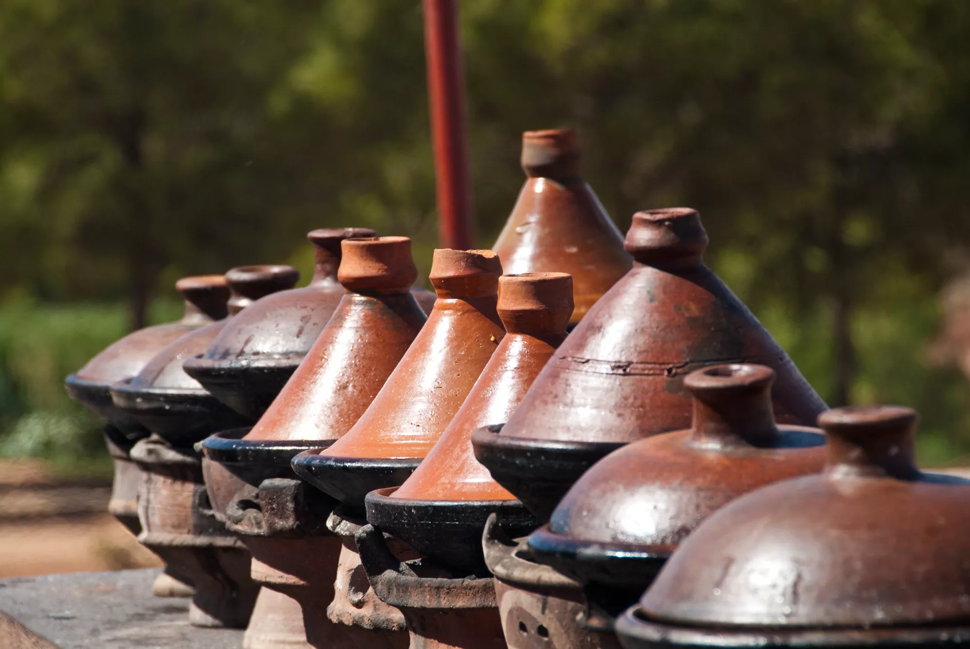 row-of-moroccan-clay-tagines-traditional-cooking-vessels.jpg